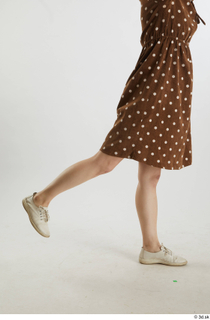 Aera  1 brown dots dress casual dressed flexing leg…